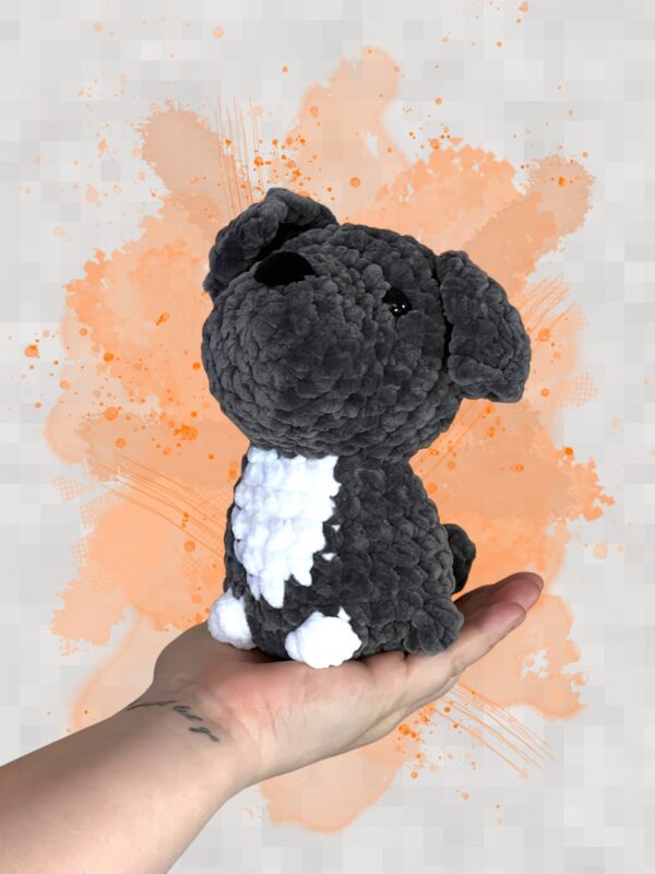 Small gray crocheted puppy