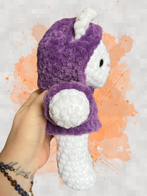 White crochet bear plushie in a purple hoodie - right view