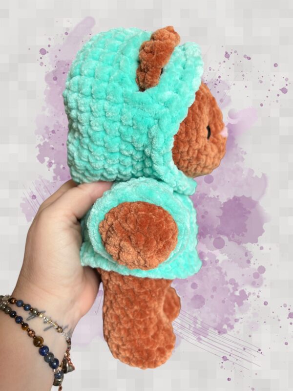 Rust crochet bear plushie in an aquamarine hoodie - right view
