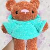 Rust crochet bear plushie in an aquamarine hoodie - front view no hood