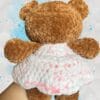 caramel brown bear in a pink & white dress