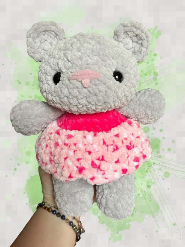 Silver plush bear in a pink speckled dress